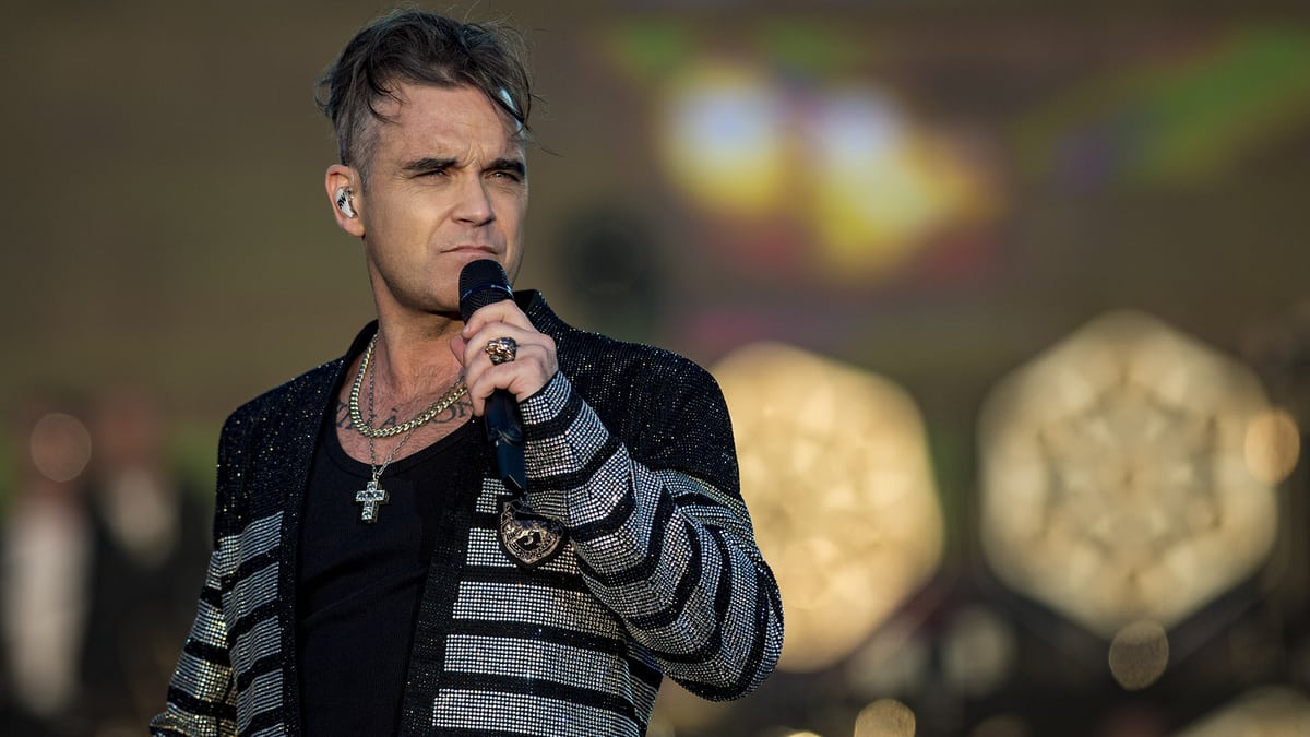 Singer Robbie Williams reveals a hitman's goal