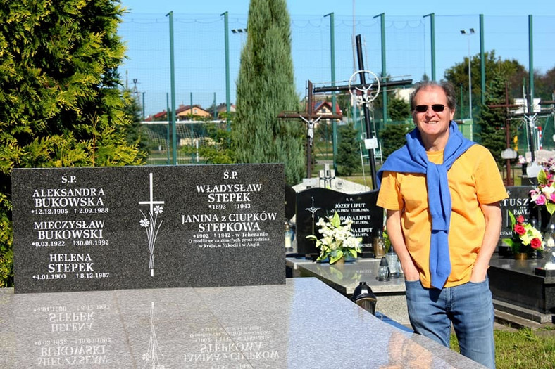 Martin Stepek next to the family cemetery in Haczów