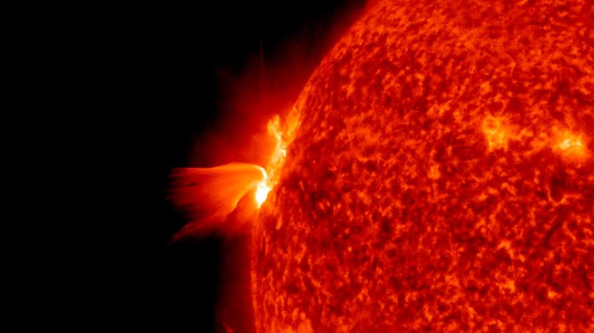 A large sunspot on the edge of a volcanic eruption.  What awaits the earth?
