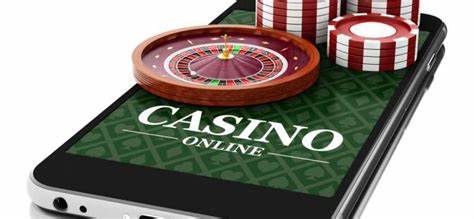 Online casino on a smartphone with chips and a roulette wheel