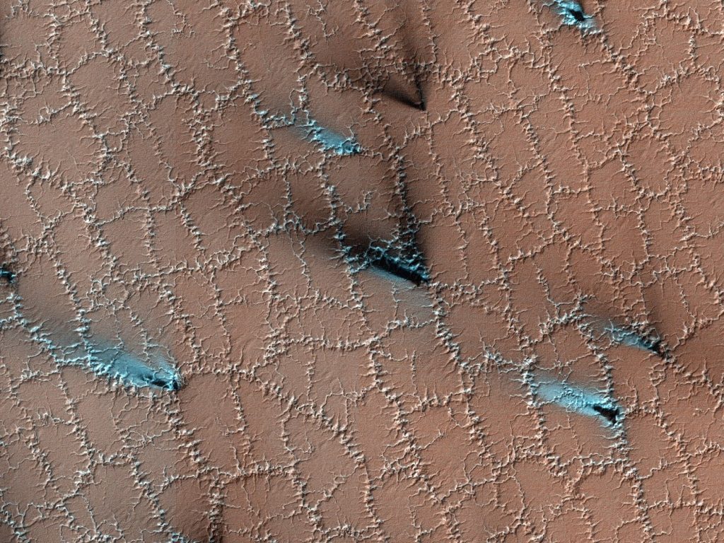 Polygonal structures on Mars.  You can see them from many kilometers away