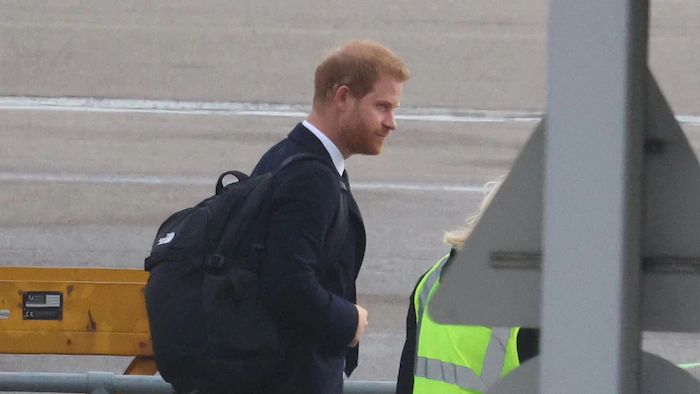 Prince Harry was spotted boarding a plane at Aberdeen Airport in Scotland. 