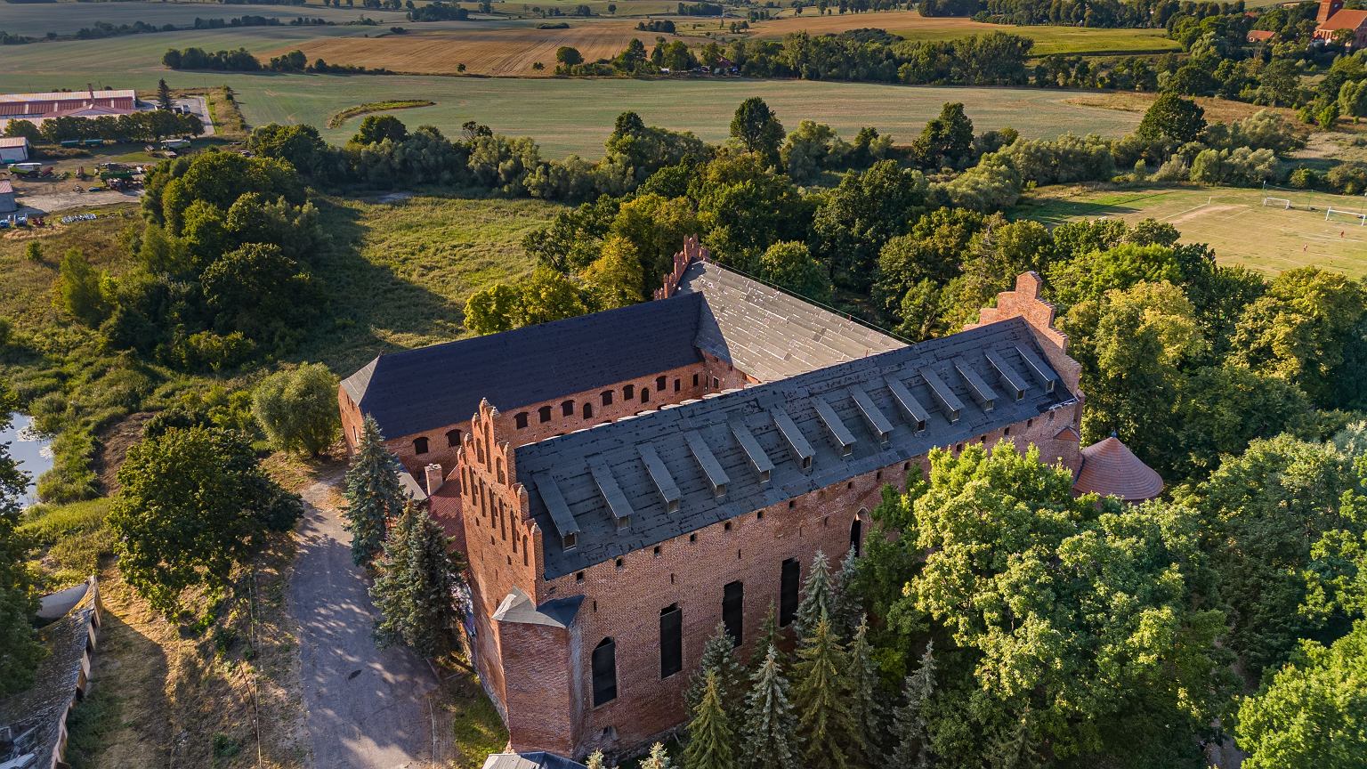A Teutonic castle in Masuria for sale.  The price of 12 apartments or three houses in Warsaw