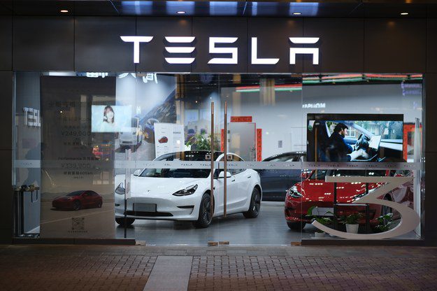Tesla showroom in Shanghai.  / stock struggle
